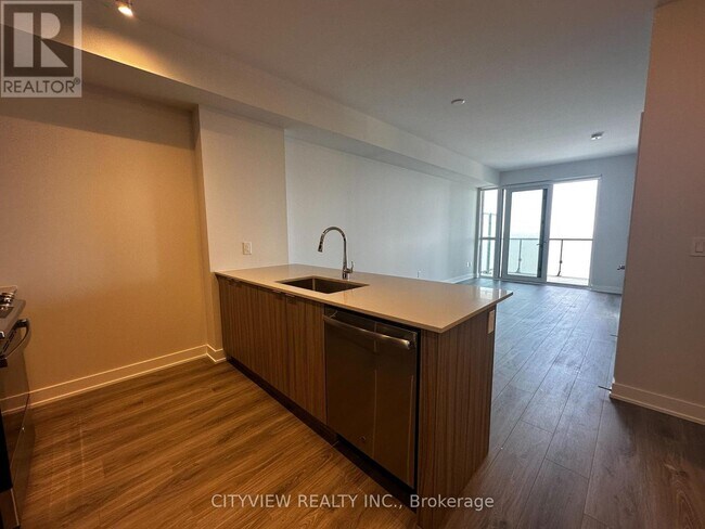 Photo du bâtiment - 430-4430 Square One Dr