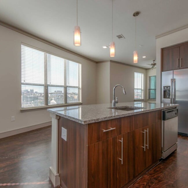 Building Photo - Experience the Art of Fine Apartment Living!