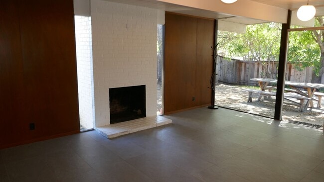 Building Photo - BEAUTIFUL UPDATED FOUR BED / TWO BATH PLUS OFFICE EICHLER HOME WITH GREAT OUTDOOR SPACE