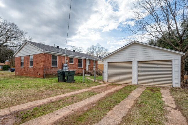 One side of garage comes with the unit - 422 E 8th St