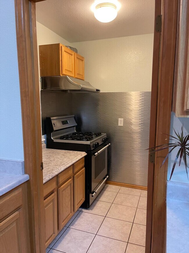 Building Photo - 2155 E 98th Ave