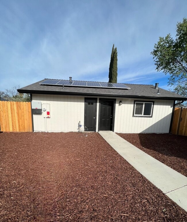 Building Photo - NEW BUILD! Beautifully designed mini home with Solar!!