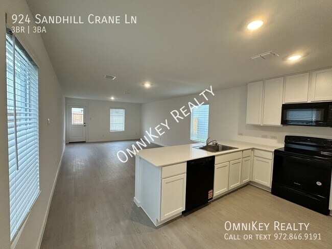 Foto del edificio - 924 Sandhill Crane Ln