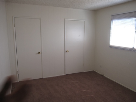 (Interior) Bedroom with dual closets - Delta Street Apartments