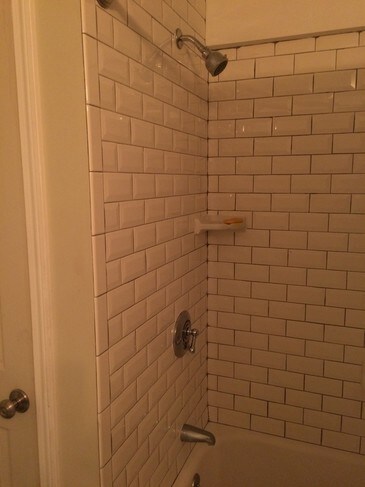 Tiled shower and bathtub - 249 Lake Dr