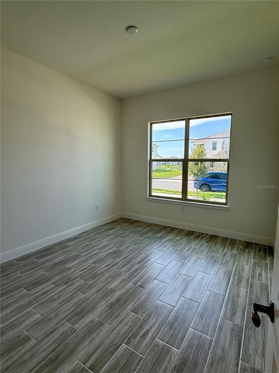 Building Photo - 5175 Buttonsage Dr