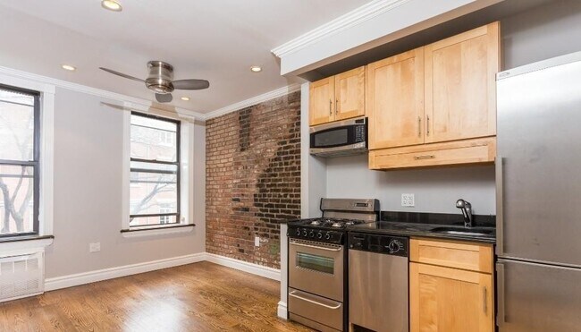 Foto del edificio - 420 E 9th St