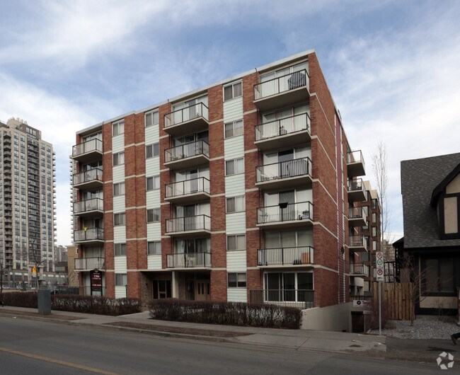 Photo du bâtiment - Camelot Suites