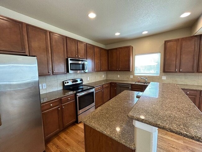 Building Photo - 9415 Torecco Ct.