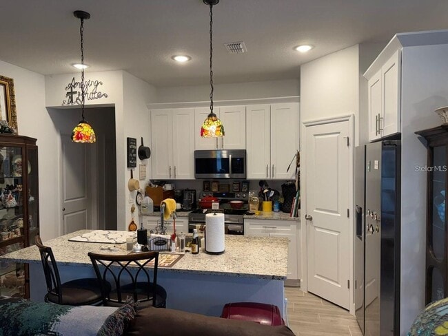 Building Photo - Tuscany Preserve Home. Lawn care, Cable and Internet included.