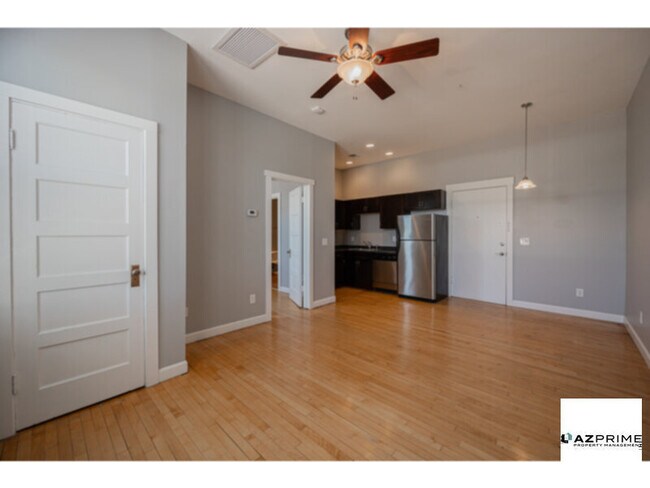 Building Photo - Experience the Allure of Downtown Living i...