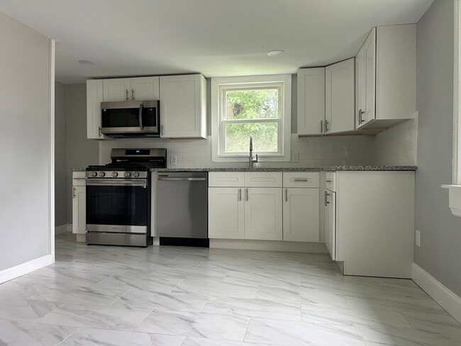 Building Photo - Beautifully Renovated Single-Family Home with Bonus Attic Storage