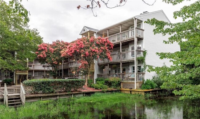 Building Photo - Introducing a charming townhouse in the he...