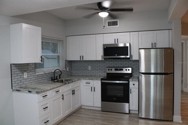 Building Photo - 10512 51st Terrace N