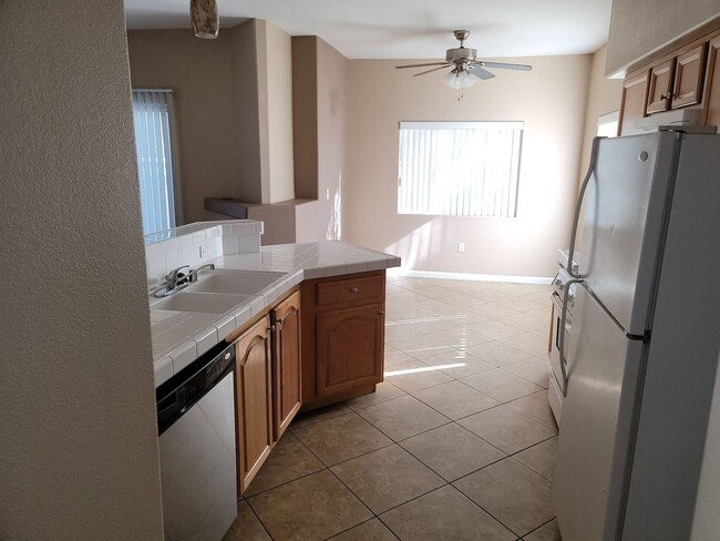 Building Photo - 2 story condo with 1 bedroom loft, 2 bathrooms and a 1 car attached garage.