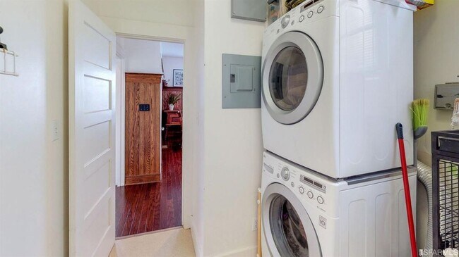 In-unit laundry room and storage closet - 328 Lexington St