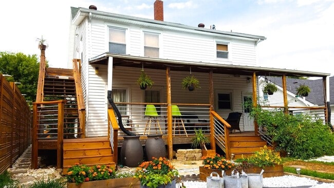 Beautifully landscaped backyard complete with vegetable garden - 1236 Sunnymeade Dr