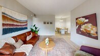 Located at 1805 Aquarena Springs Dr in San Marcos, TX, this well-designed one-bedroom, one-bathroom residence offers a thoughtfully organized single-floor layout. Light wood-style flooring runs throughout the main living areas, lending a clean, cohesive aesthetic that enhances the sense of openness.

The combined kitchen and living area forms the heart of the home. The kitchen features white cabinetry, white appliances including a refrigerator, electric range, built-in microwave, and a functional galley-style layout that maximizes efficiency. A dining area with a pendant chandelier sits adjacent, creating a natural flow between cooking and entertaining spaces. The living room benefits from a sliding glass door that invites natural light and provides outdoor views, complementing the airy, neutral color palette.

A hallway connects the main living space to the private bedroom, which is carpeted for comfort and includes a ceiling fan, a window with outdoor views, and a dedicated closet. The bedroom offers a calm, restful atmosphere well-suited for relaxation.

The bathroom is cleanly finished with white cabinetry, a single vanity with a large mirror, and a shower-tub combination. Throughout the home, the consistent use of light tones and practical finishes creates a welcoming and functional living environment.