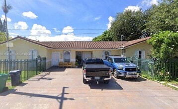 Building Photo - 9740 NW 5th Ave