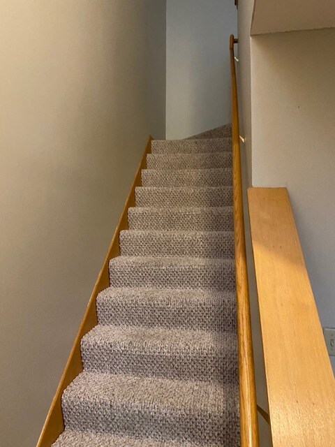 Stairs to second level - 8793 N Bay Dr