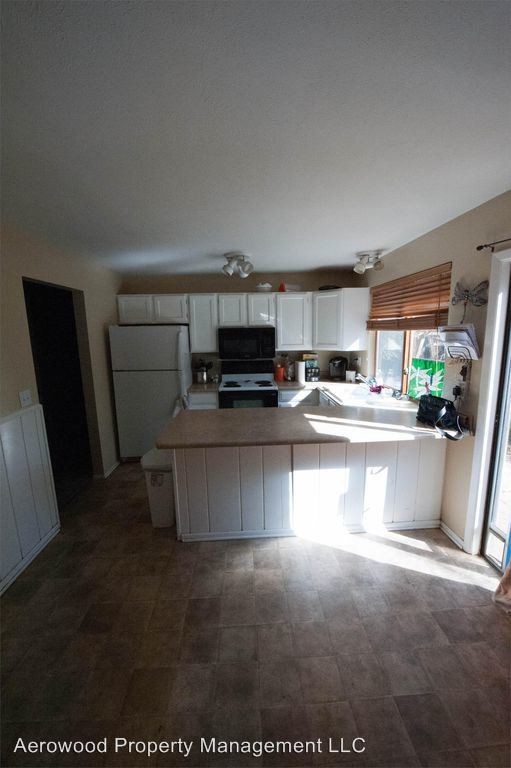 Building Photo - 4 br, 2 bath House - 14824 E. Colgate Drive