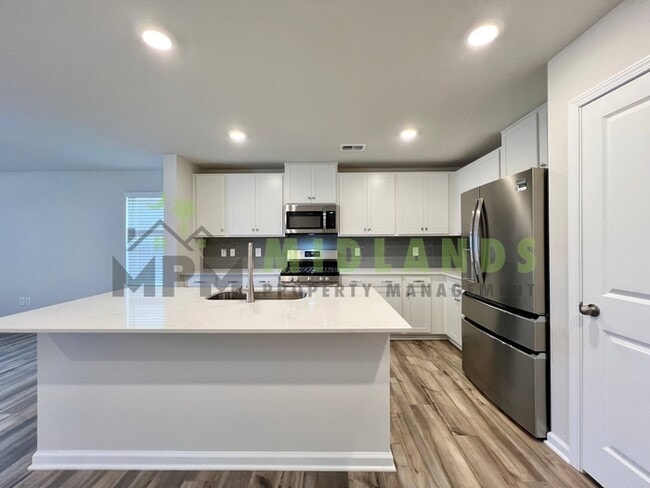 Foto del edificio - 1221C Champions Rest