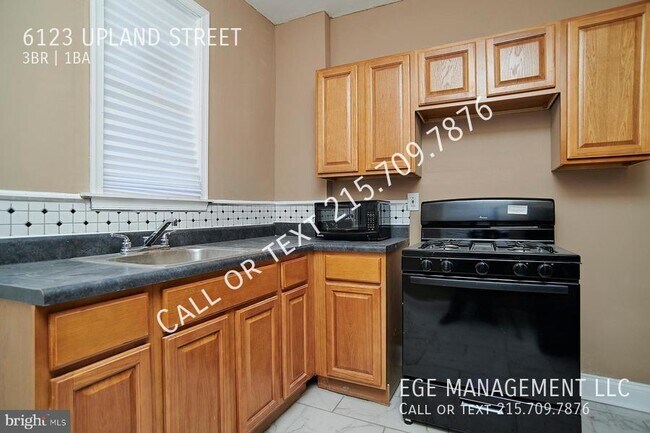Foto del edificio - 6123 Upland St