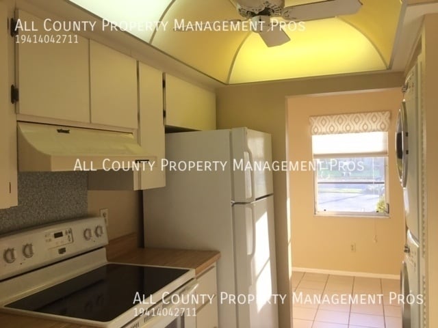 Building Photo - 7060 W Country Club Dr N
