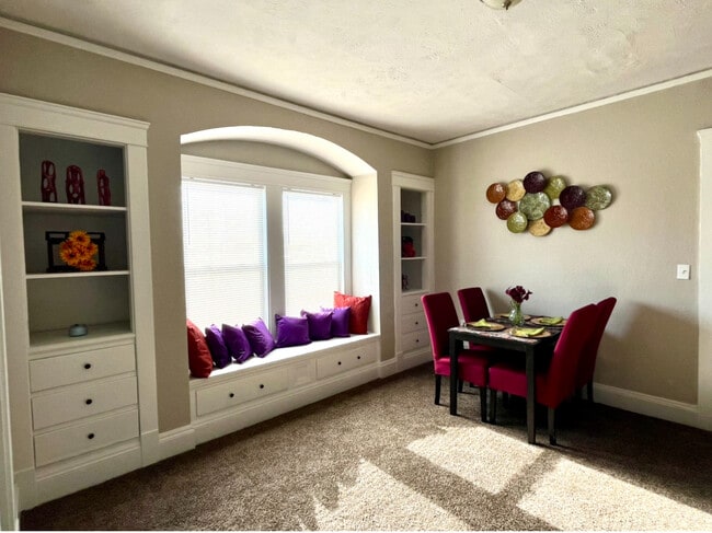 Built-ins, window seat, ample storage, carpeted. - 603 E 109th St