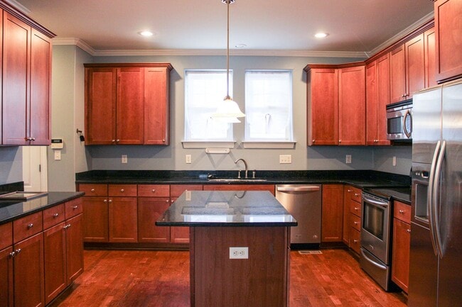 Building Photo - Welcome to this stunning 3-story Beach Cot...