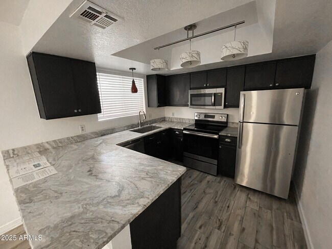 Foto del edificio - 1402 S JENTILLY Ln