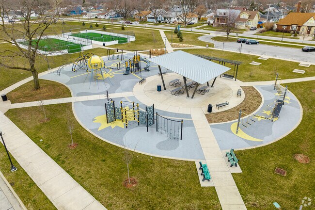 Edison Park features twin soccer fields, new playground, central picnic tables, and a walking trail around the perimeter