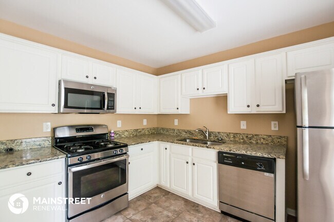 Building Photo - 6170 Queensdale Dr