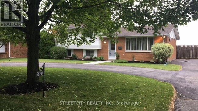 Building Photo - 6860 Malden Rd