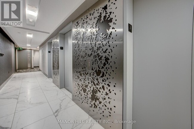 Building Photo - 305 - 25 CAPREOL COURT