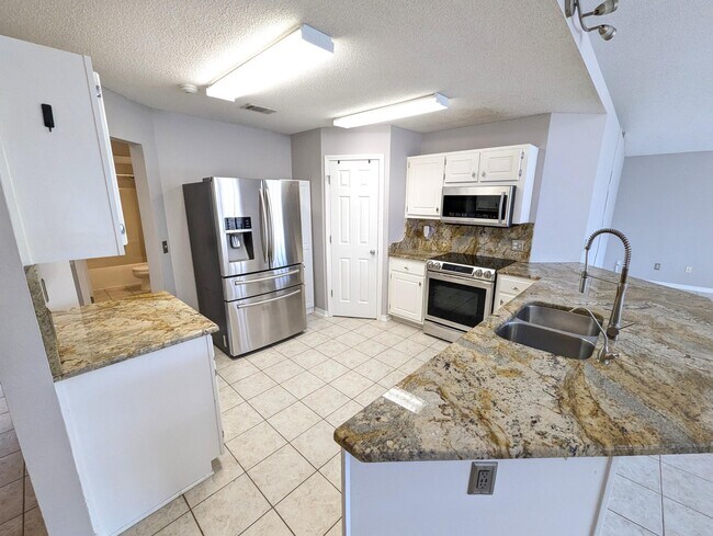 Foto del edificio - 9475 Pine Lily Ct