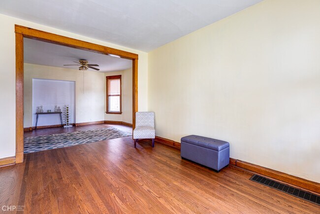 Can fit L-shaped sofa or desk area - 1833 N Harding Ave