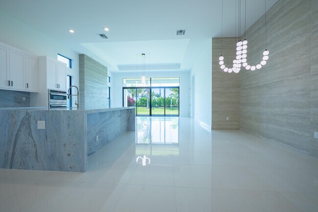 Foto del edificio - 9597 Regal Palm Ct