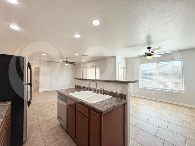 Building Photo - 10545 W Buena Vista Dr