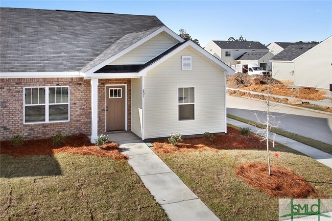Building Photo - 600 Trellis Square