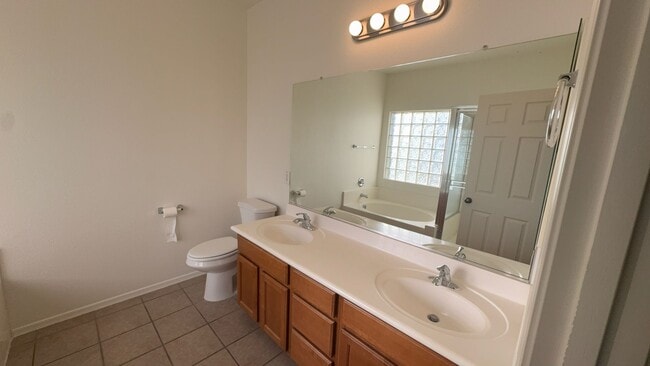 Building Photo - Stylish 3BR Oasis: Open Layout, Gourmet Kitchen, Master Retreat, and Serene Patio! Your Dream Hom...