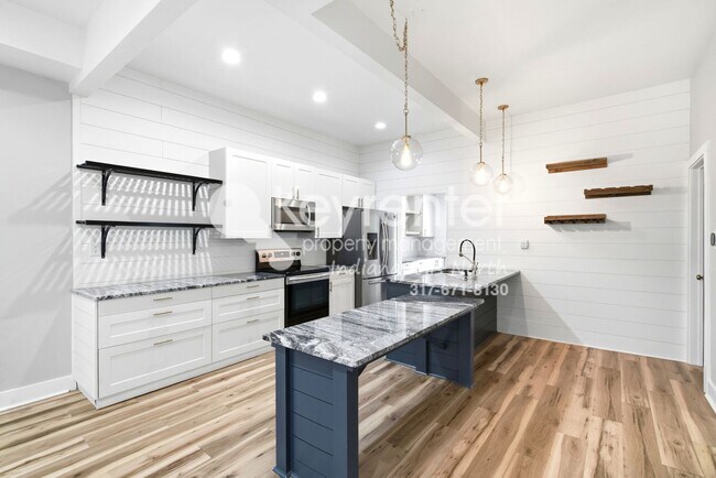 Foto del edificio - Move-In Ready 4-Bedroom Home with Granite Kitchen & Fenced Yard