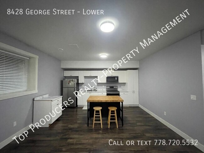 Photo du bâtiment - 2 Bedroom Suite - Includes Utilities