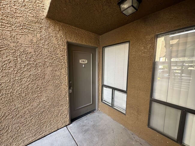 Building Photo - Ground Level 2 Bed Condo in Desert Shores ...
