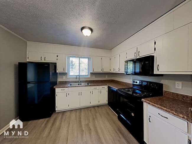 Building Photo - 6450 Ashdale Dr
