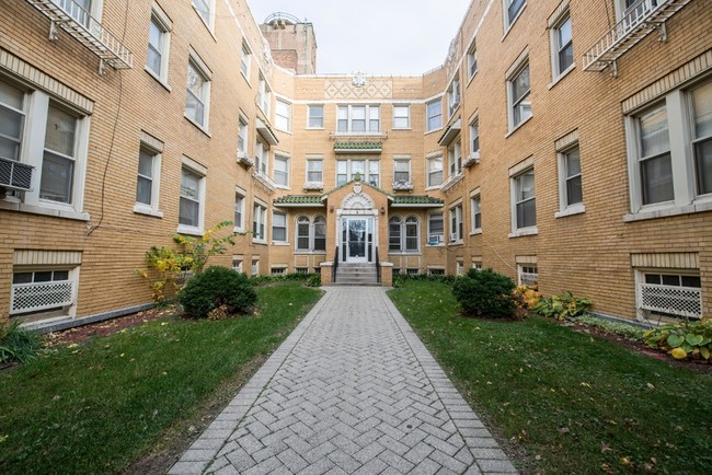 Building Photo - 5957-73 W Madison St 11-17 S Austin Chicago, IL 60644