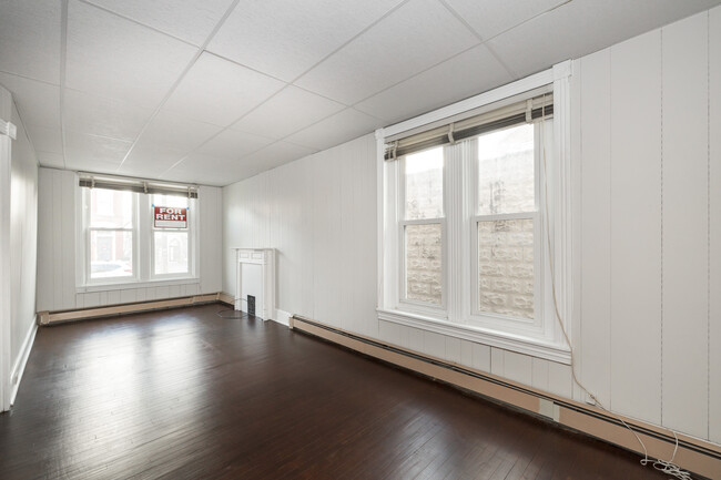 Large open living area with hardwood floors - 351 Cherry St