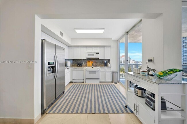 Building Photo - 6301 Collins Ave