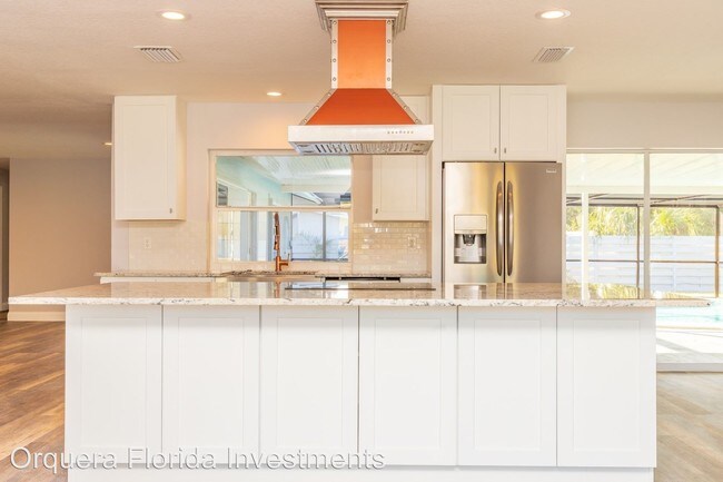 Foto del edificio - 4 br, 3 bath House - 4414 Riverwood Ave