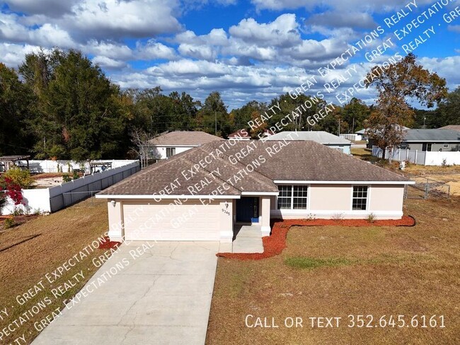 Building Photo - Fenced & Tiled 3/2/2 Summerfield Home For ...